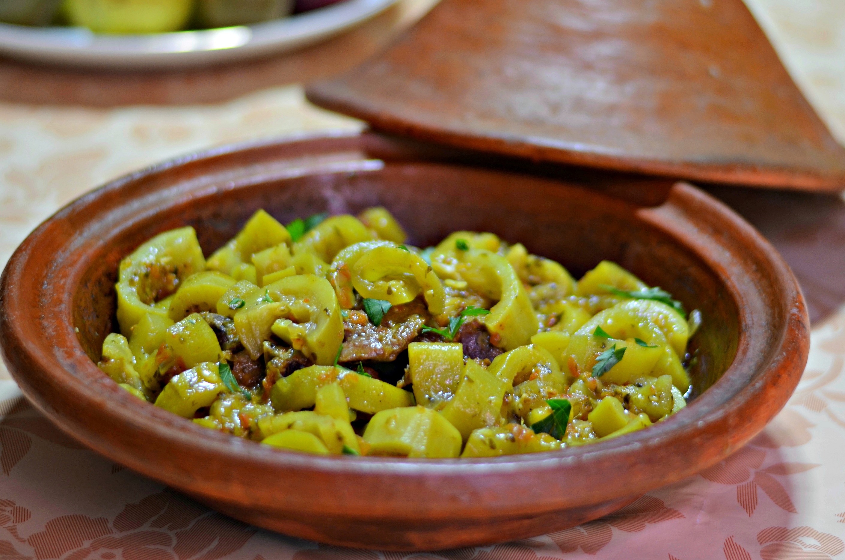 Moroccan clay tagine dish with beef and bottle gourds