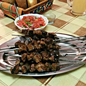grilled skewers of liver wrapped in caul fat