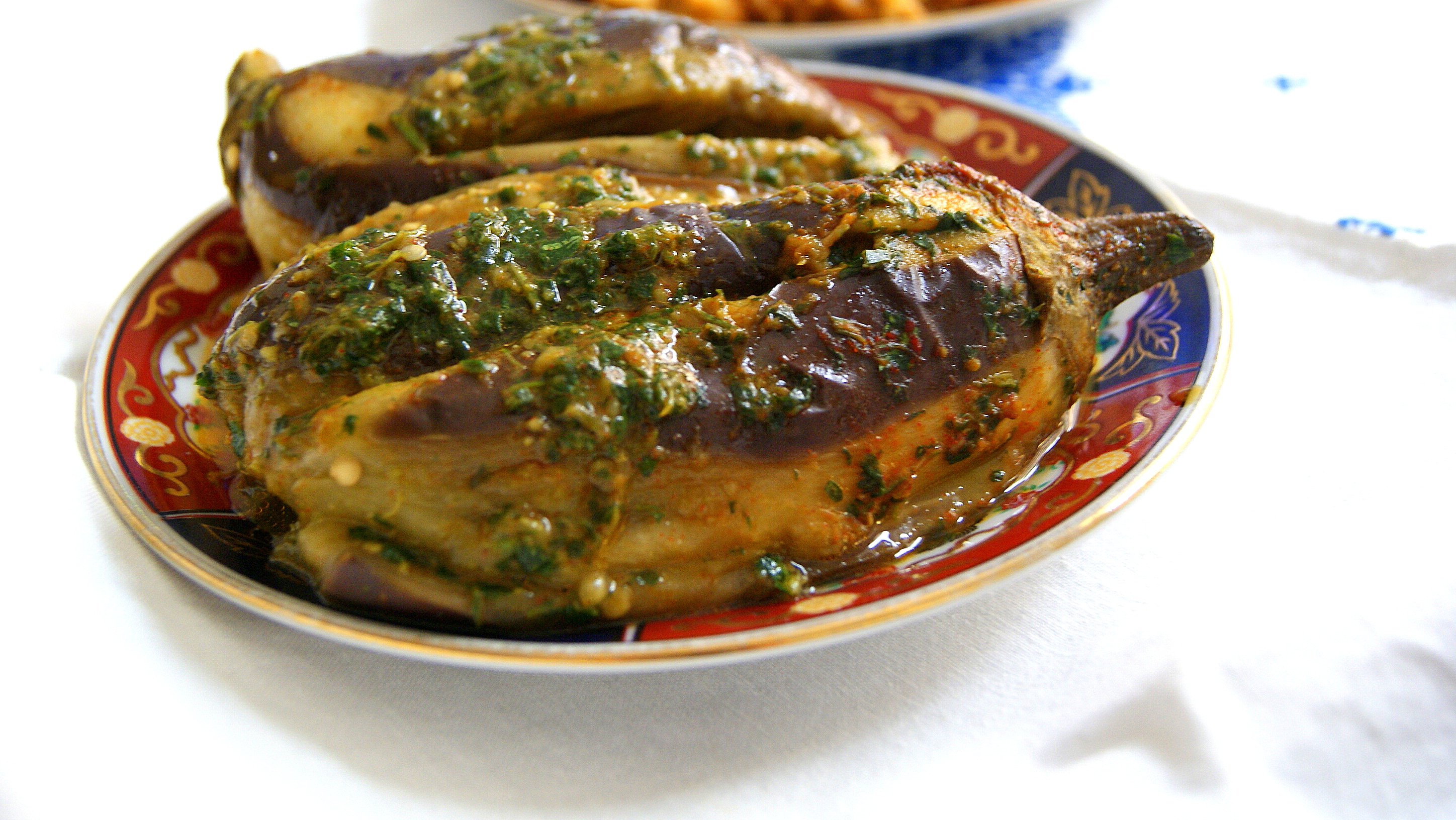 A whole steamed eggplant with chermoula, a Moroccan herb and spice marinade.