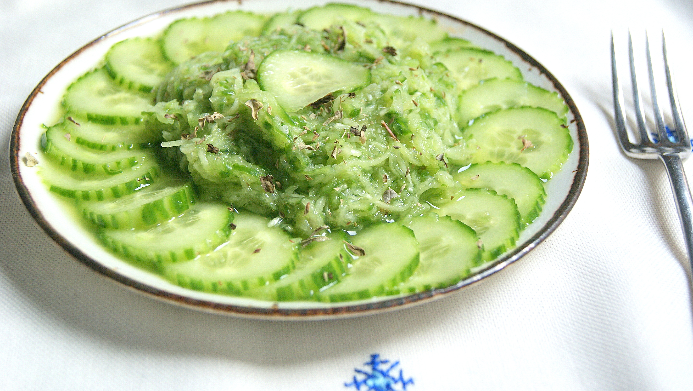 Moroccan bendy cucumber salad with oregano in grated and sliced form