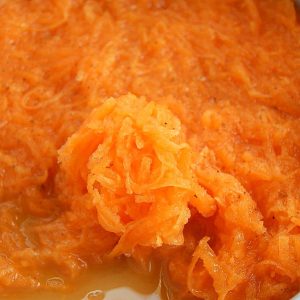 Moroccan carrot and orange salad, carrots shown finely grated