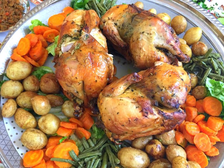 3 steamed and roasted chickens with herbs stuffing served with vegetables